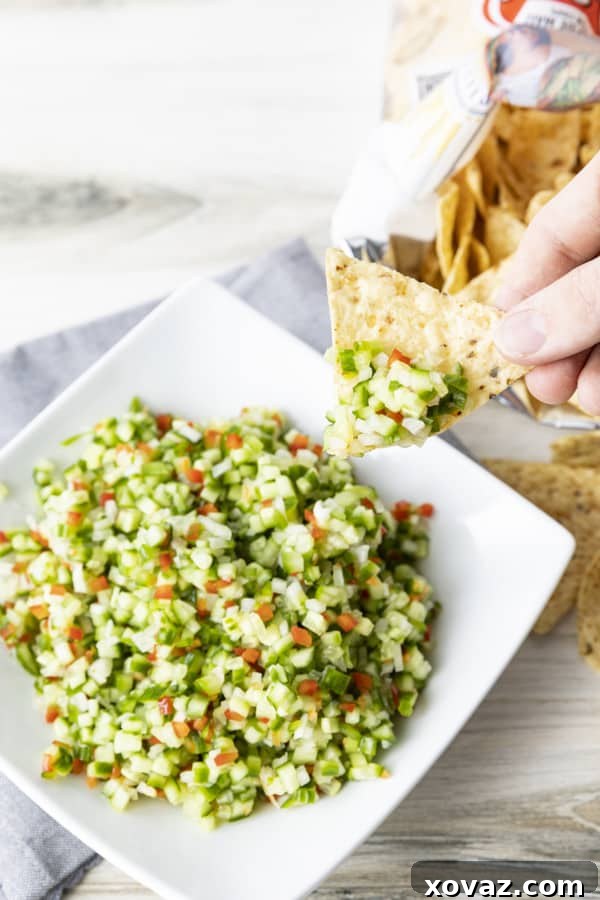 Dill Pico 8 A bowl of fresh Pickle de Gallo, a tangy dill pickle salsa, ready to be served.