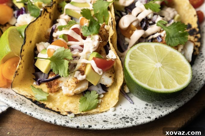 A selection of fresh and colourful toppings for Air Fryer Fish Tacos
