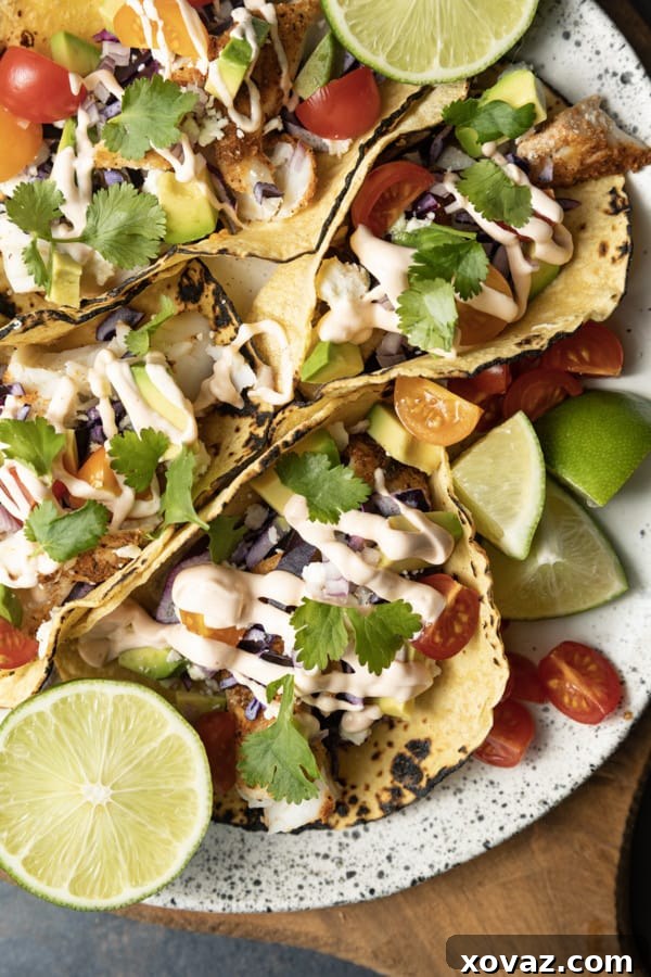 Close-up of a finished Air Fryer Fish Taco with generous toppings