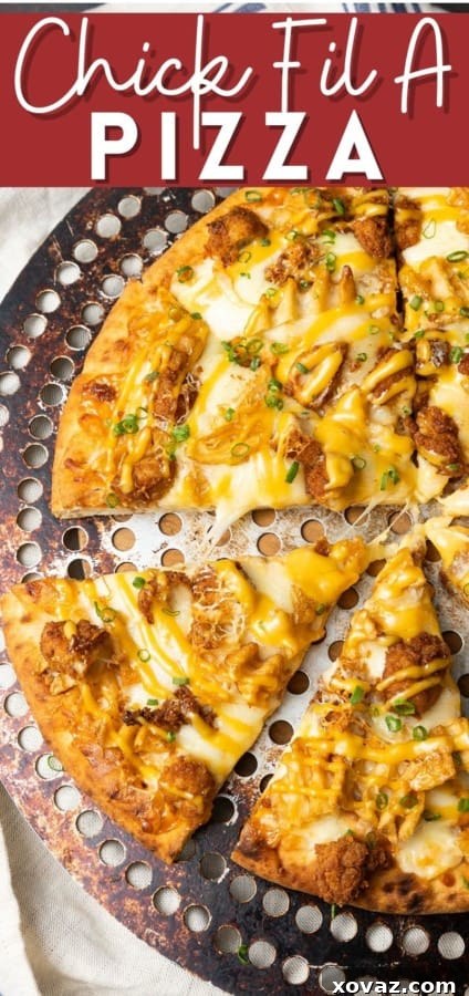 A tempting slice of Chick-fil-A Pizza being lifted, showing off the perfectly melted cheese and toppings.