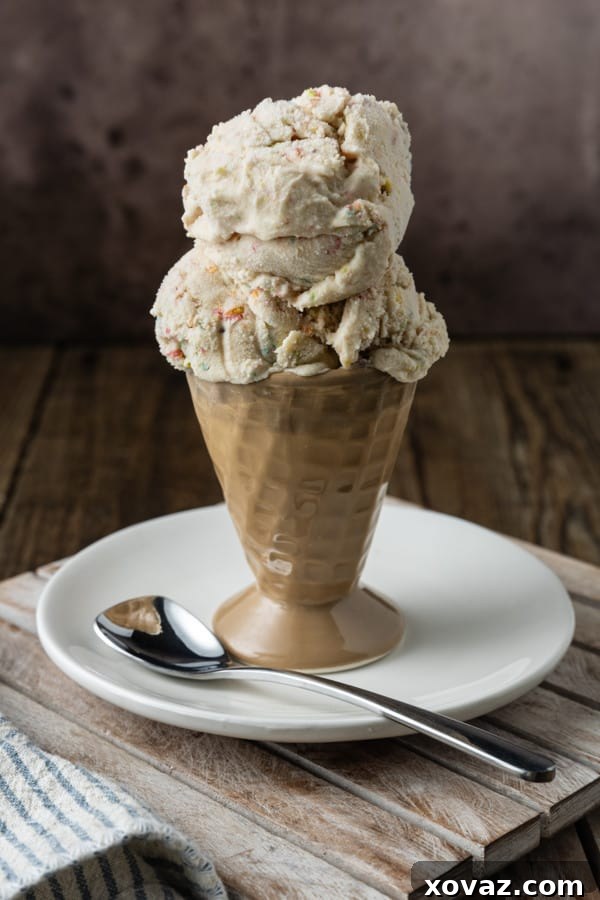 This easy, no-cook Fruity Pebbles Ice Cream tastes like a sweet bowl of your favourite fruity flavour cereal in ice cream form. It's a party!