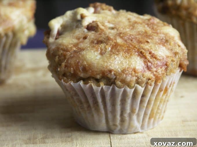 Delicious Bacon and Swiss Rye Muffins cooling on a wire rack.