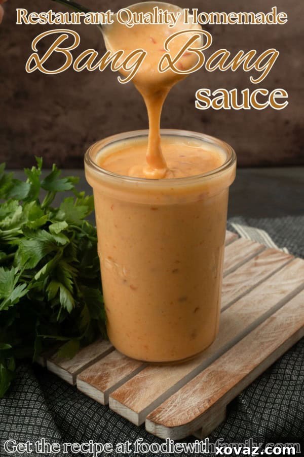 Restaurant Quality Homemade Bang Bang Sauce Bang Bang Sauce in a jar with text overlay describing the photo