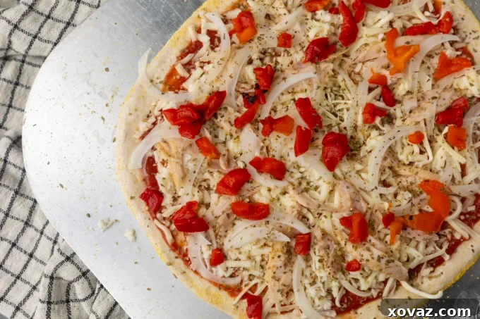 Ingredients for tuna pizza arranged on a counter