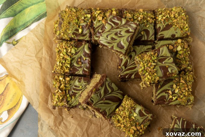 Stacked Dubai Chocolate Brownies on parchment paper