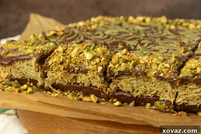 A perfectly cut Dubai Chocolate Brownie on parchment paper