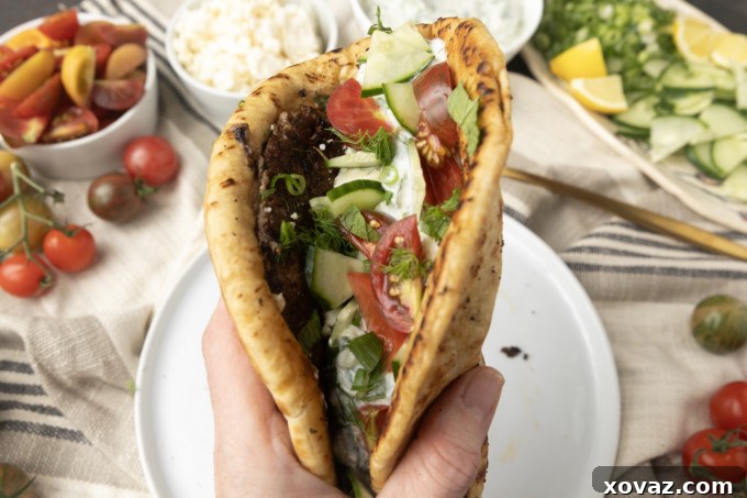 Close-up of freshly cooked ground lamb gyro meat with a crispy crust.