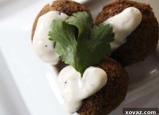 Versatile Garlic Anchovy Mayonnaise Dip A serving of homemade garlic anchovy mayonnaise, garnished with a sprig of fresh parsley or dill, ready for dipping.