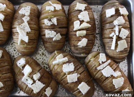 Delicious baked potatoes, challenging the notion of a 'boring' side dish.