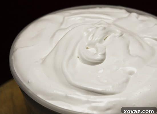 Creamy homemade marshmallow fluff in a bowl, ready to be spread