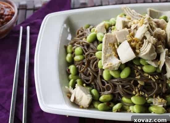 Close-up of Cold Tuna and Edamame Soba Salad garnished with fried garlic
