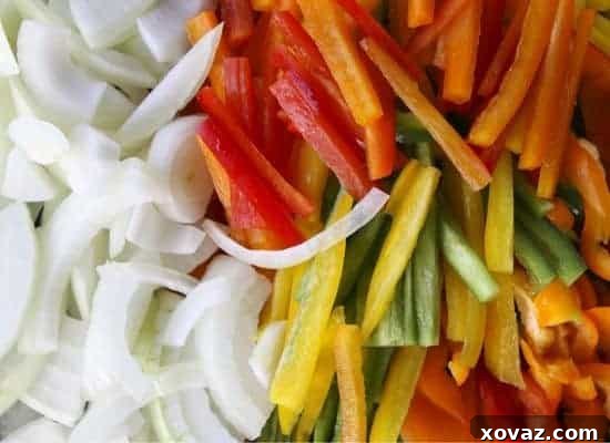 italiansausage3 Sliced bell peppers and onions ready for sautéing