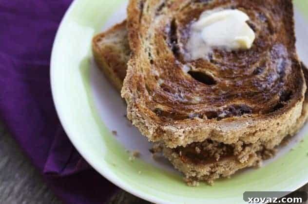 Close-up of baked cinnamon swirl bread with streusel topping