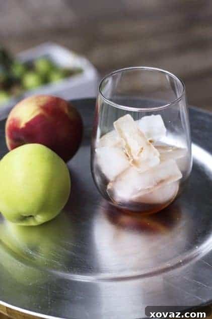 Versatile Uses for Boiled Cider Several bottles of homemade boiled cider, ready for storage or gifting