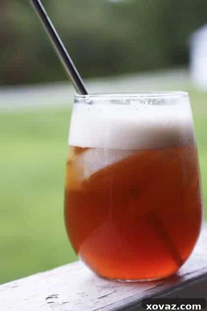 Boiled Cider: A Taste of Heritage A bottle of boiled cider with a simple, rustic label, evoking homemade charm