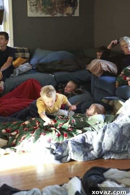 A group of boys, exhausted, sleeping on the floor after a long sleepover