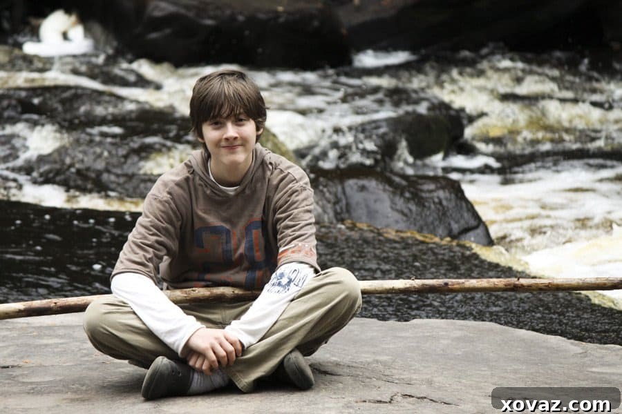 Two young boys, walking hand-in-hand, symbolizing chocolate and vanilla