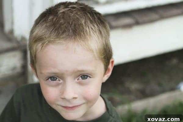 Two young boys enjoying an outdoor activity, vibrant and full of life.