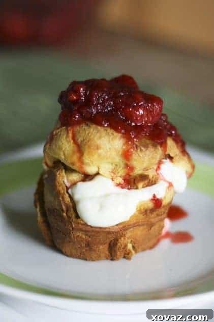 Close-up of a popover split open, ready for filling.