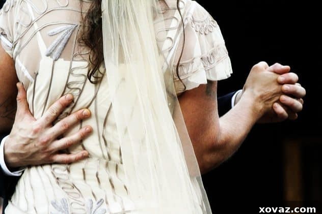 The happy couple, Luke and Elvi, celebrating their wedding with family and friends.