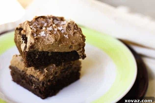 Brownie Cake with Nutella Peanut Butter Frosting, topped with sea salt flakes.