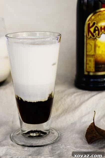 Creamy White Russian Milkshake, a delicious boozy adult dessert drink perfect for any occasion.