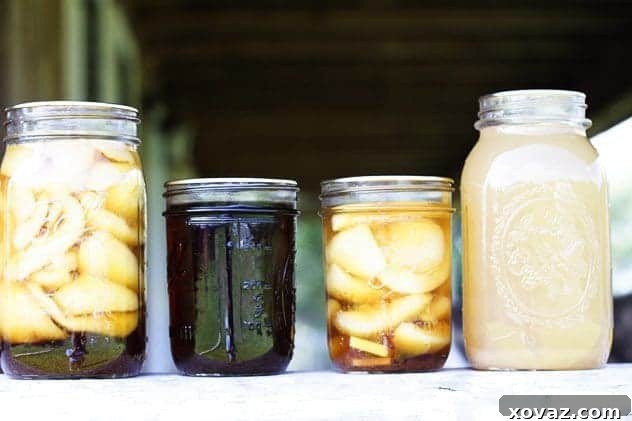 Beautifully canned ginger pears in dark syrup, ready for storage.