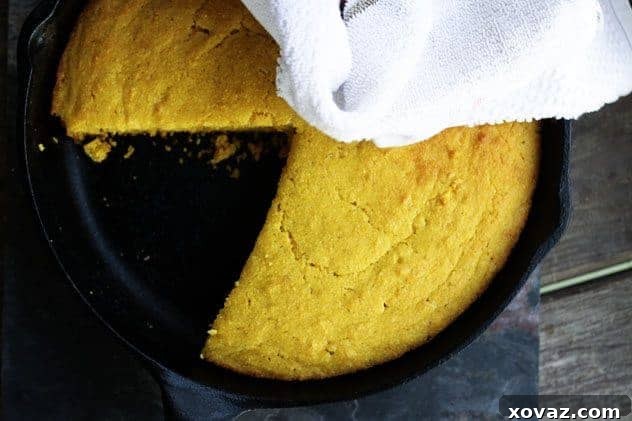 Grandma Shaffer Buttermilk Cornbread Grandma Shaffer Buttermilk Cornbread, a golden-brown wedge in a cast-iron skillet